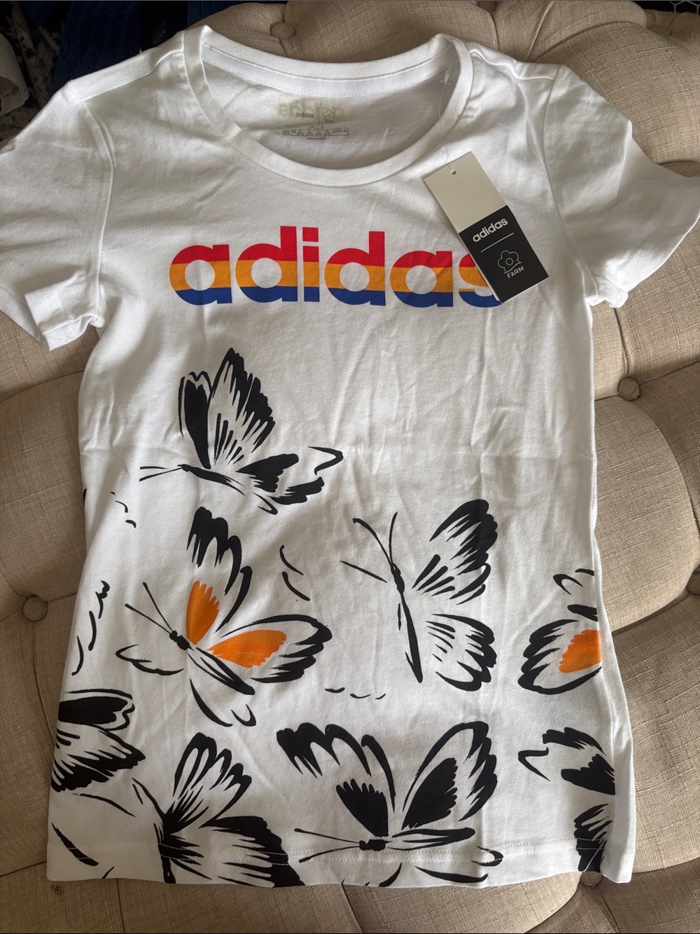 adidas White Tee with Multicolor Logo & Black and Orange Butterfly Print